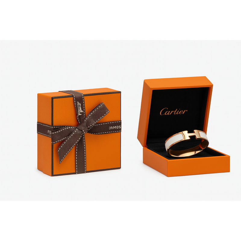 Hermès uses its signature orange box with brown ribbon, instantly recognizable worldwide.