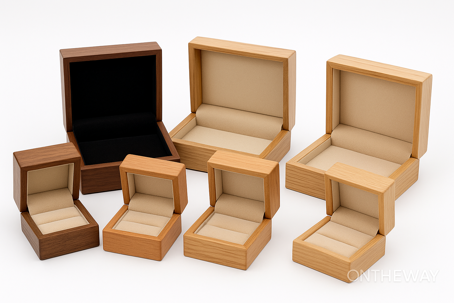Assorted wooden jewelry packaging boxes in walnut, cherry, and light wood finishes, featuring ring, necklace, and multi-purpose interior designs for premium jewelry display and storage.