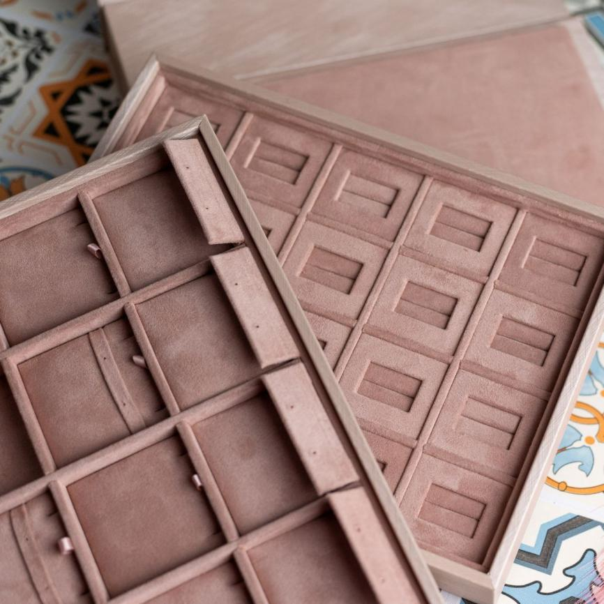 We offer more than just trays; we provide tailor-made solutions to help your business grow, save costs, and enhance your jewelry display.