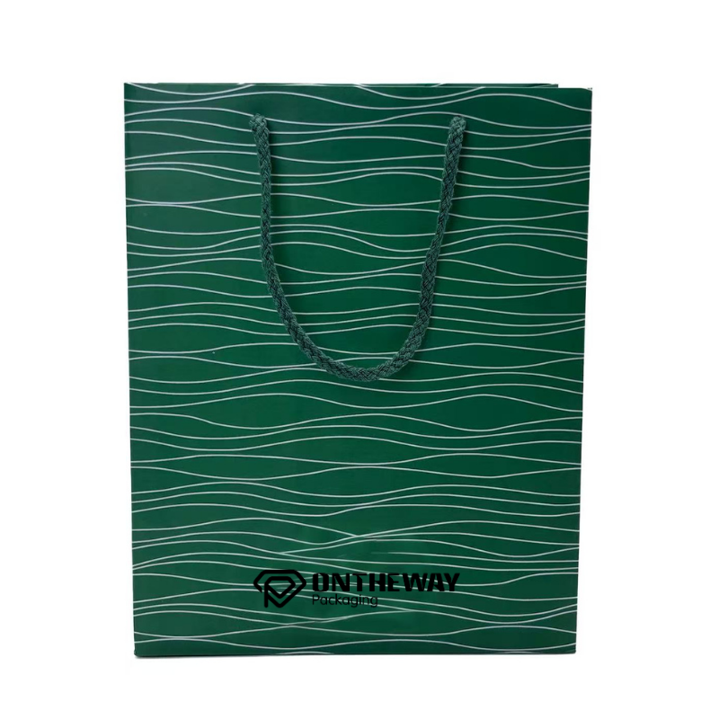 Luxury laminated paper bags with glossy or matte coatings are often used for high-end jewelry and gift packaging. 